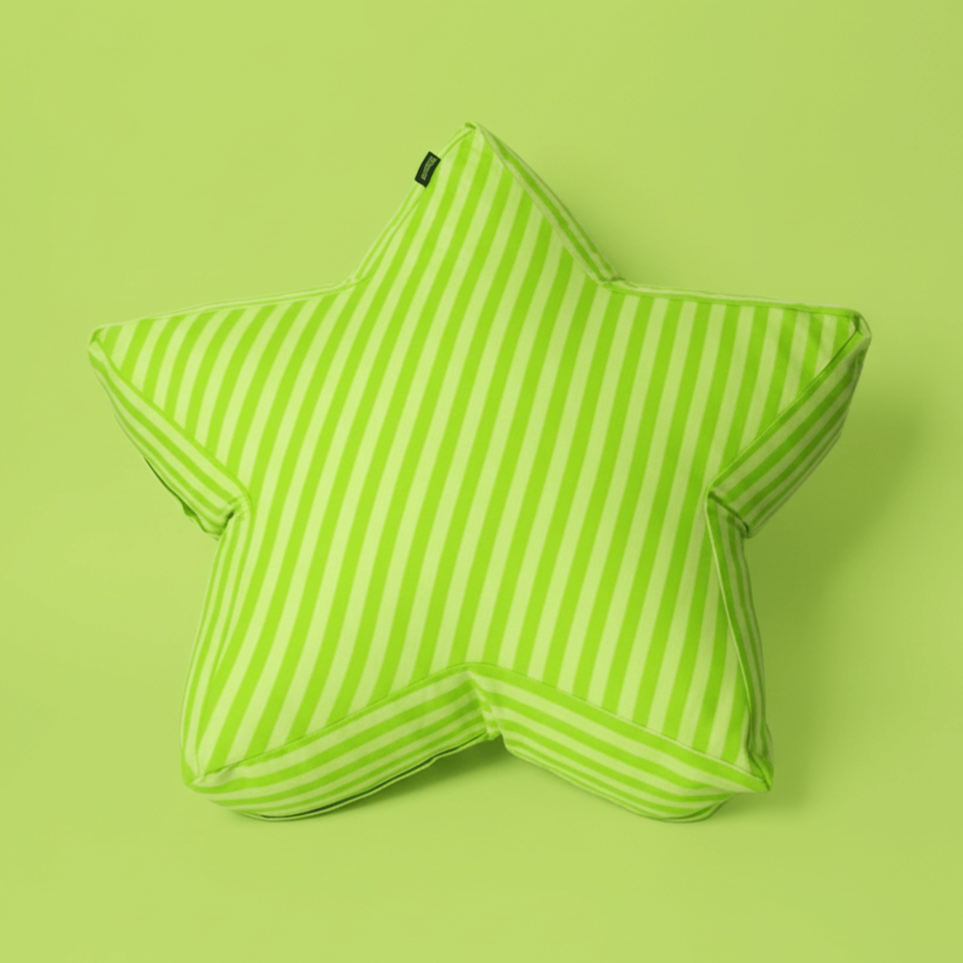 Superstar Crash Pad floor cushion with vibrant lime green and pale green stripes. Large star-shaped toddler seat made from eco-friendly recycled foam, perfect for bright playroom decor.